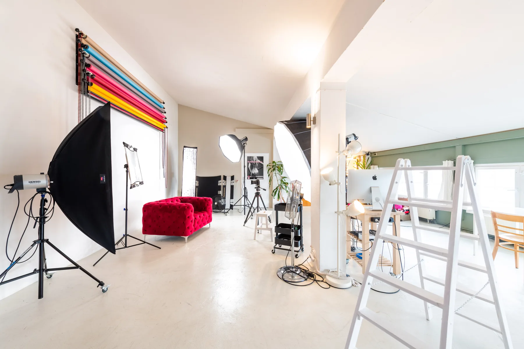 Studio with background rolls and lighting setup